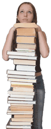 Woman standing behind a stack of books